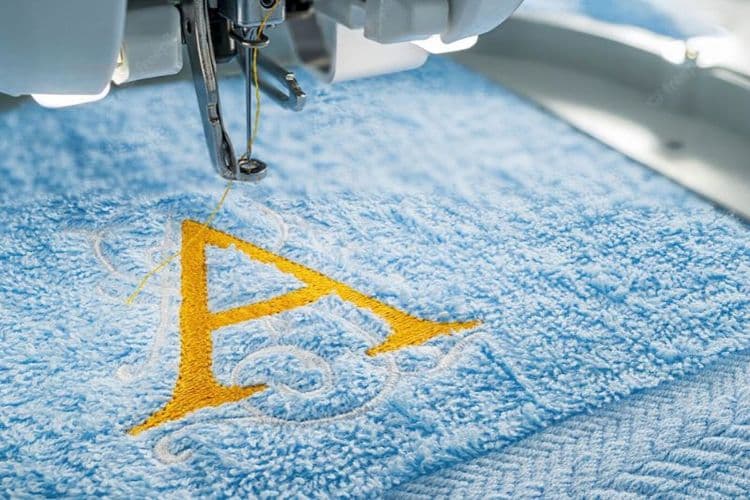 abbigliamento lavoro ricamo